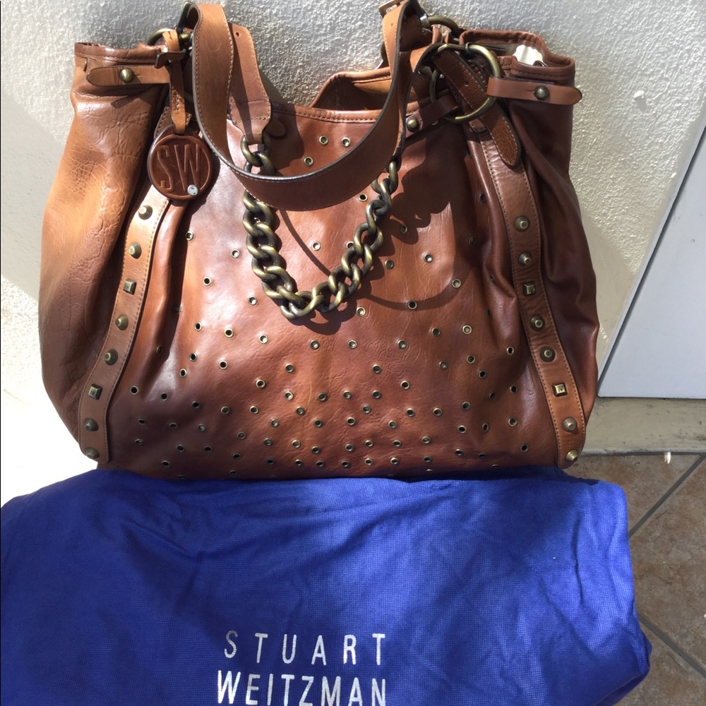 STUART WEITZMAN
leather gromet oversize bag